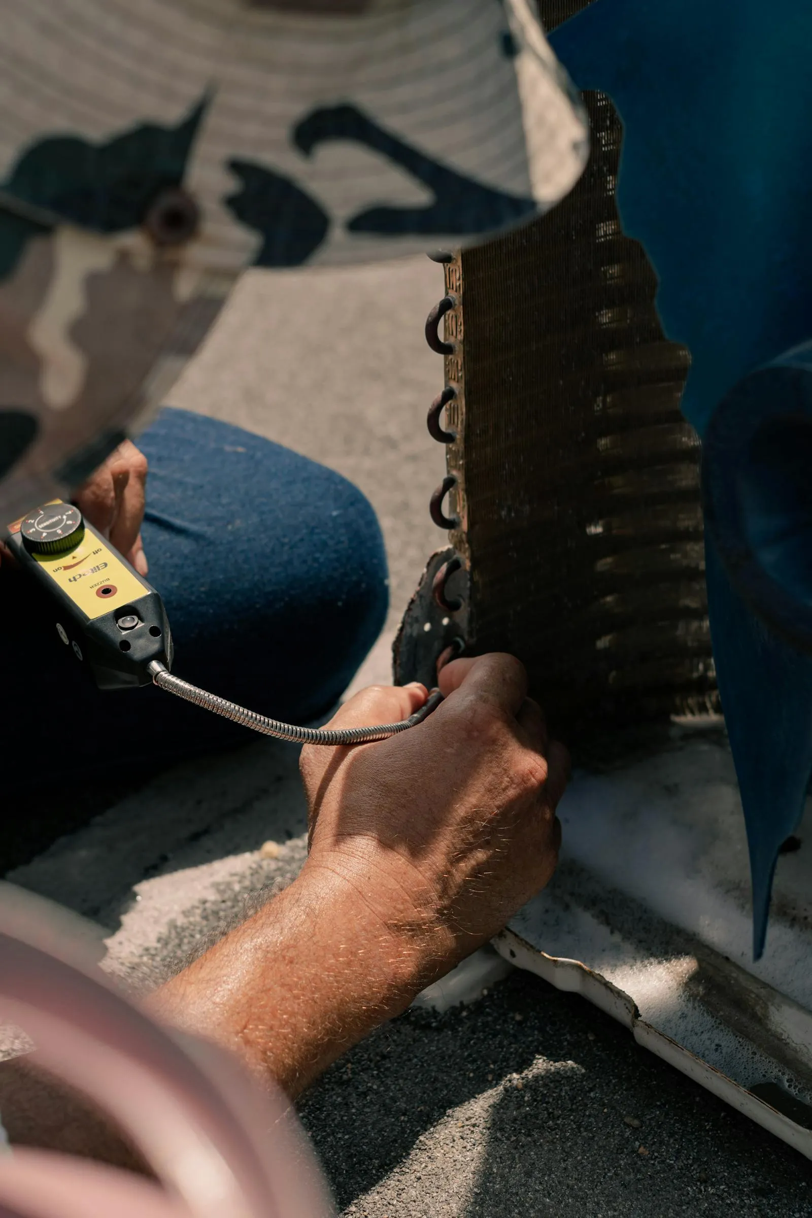 Close-up of air conditioner maintenance and repair